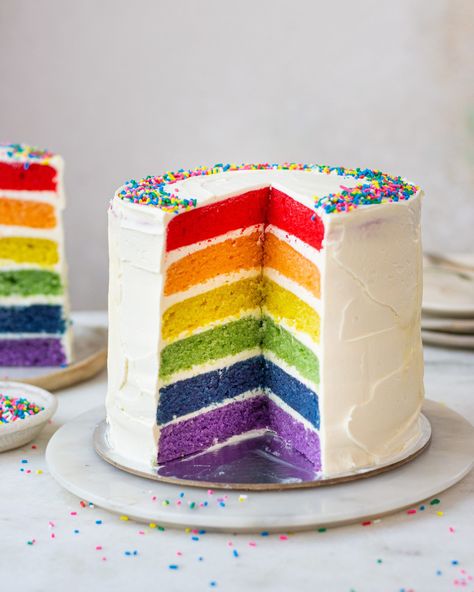 It’s the perfect cake for any occasion and looks so professional, you are sure to impress everyone around you once you make it. This is a six layered cake, each layer representing one color of the rainbow. The end stack of all layers looks so pretty in the end and is worth all the effort that you put into it. Let’s go through a few things you need to know before you make the rainbow cake. Rainbow Cake Recipe, Rainbow Layer Cakes, About Rainbow, Eggless Cake Recipe, Cake Pricing, 7 Layer, Cake Youtube, Cake Mix Recipes, Cake Images