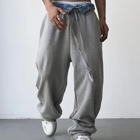 Houzhou Hip Hop Grey Button Jean Elastic Waist Loose Y2K Casual Men`s Sportswear Pants are a Way to Step in Stride. These Sweatpants can be worn Any Time Of Year. They are Loose Fitting with a Drawstring to help Tighten Against Your Waist and they have a Button Jean built inside for a great Street Wear Look. The Sweatpants are Midweight and made with Cotton for a Nice Feeling. It`s a Urban Streetwear Look that will have others gassing at you. So are you ready to step in stride? Order A Pair ... Casual Clothes Men, Sweats Style, Men Sweatpants, Elastic Waist Jeans, Grey Sweats, Y2k Casual, Urban Streetwear, Street Wear Urban, Men's Sweatpants