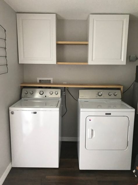 Laundry Room Storage Solutions - Add cabinets and shelving above washer and dryer for storage and organization. #laundryroom #farmhouse Laundry Room Storage Solutions, Laundy Room, Laundry Room Storage Shelves, Small Laundry Room Organization, Tiny Laundry Rooms, Room Storage Diy, Bilik Air, Laundry Room Renovation, Farmhouse Laundry