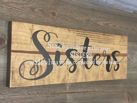 Sisters Connected by the Heart Wooden Quote Sign A beautiful gift for someone you define as sister in your life. Lovely gift to give/receive.  "Side by side or miles a part SISTERS will always be connected by the heart"  💛 SIGN 💛 is hand stained with permanent vinyl lettering. All of our signs are unique. We allow the natural beauty of the wood to show through, so expect slight variations in the color, grain, knots, etc. Although the sign can withstand the elements, it is recommended they are Sister Signs, Wooden Quotes, Sister Sign, Wood Burned Signs, Wooden Signs With Sayings, Sibling Gifts, Sister Quotes, Gift For Sister, Wood Gifts