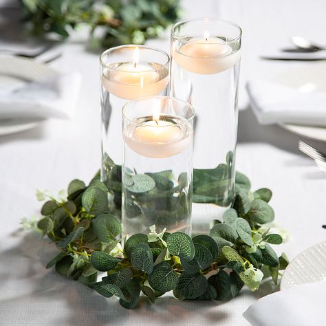 28 Pc. Eucalyptus Wreath Centerpiece Kit for 4 Tables - OrientalTrading.com Decor For Wedding Tables, Wedding Reception Theme, Cylinder Centerpieces, White Floating Candles, Eucalyptus Decor, Eucalyptus Wreaths, Reception Theme, Wedding Reception Themes, Wreath Centerpiece