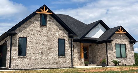 Another beautiful house made out of... - Statesville Brick Brick And Vertical Siding Exterior, Board And Batten Exterior With Brick, Brick And Batten Exterior, Brick And Batten, Vertical Siding Exterior, Brick Farmhouse, Board And Batten Exterior, Brick Companies, Vertical Siding