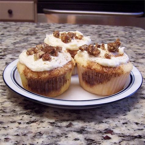 Cinnabon® Cupcakes Recipe | Allrecipes Flavored Cupcakes, Fluffy Frosting, Cinnamon Syrup, Cinnamon Cake, Cinnamon Recipes, Warm Cake, Cupcake In A Cup, Cupcake Flavors, Coffee Cakes