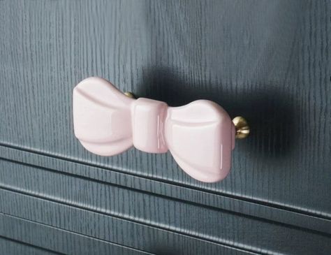 "Bow Ceramic Knob Cabinet Pulls Drawer Knob Dresser Pull Knobs Handles Kitchen Knobs Pulls Cabinet Pull Hardware BHK667 The price is for one piece Measurements: Length: 5.15\" (131mm) Hole Spacing (Center to Center): 3.75\" (96mm) Material: Ceramic Screw included. M4. Length 1\" (25mm). If you need other size screws, pls let me know." Cowuette Dresser, Pink Dresser Knobs, Bow Dresser Knobs, Nursery Drawer Pulls, Drawer Knobs Ideas, Pink Room Accessories, Bow Ceramic, Pink Bedroom Accessories, Kitchen Knobs And Pulls