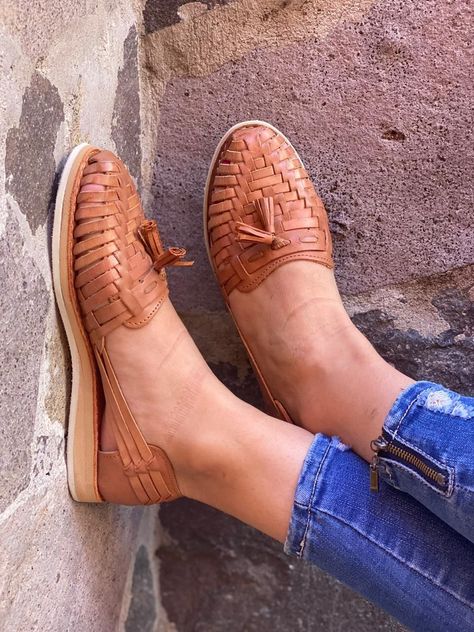 These Loafer style slip on Huarache sandals come all the way from Guadalajara. Closed toe design with the traditional kwarachi weaving. Comes in the color tan. Product Description: Genuine leather Vegetable based dyes Tassel Loafer Please note that these run slightly tight. Natural blemishes may appear and darkening happens with exposure to sun due to the use of leather. Different screens may show a slight difference in color. Sizing Chart Fit Recommendation: True to size, slightly snug. If you Mexican Sandals, Huarache Sandals, Handmade Sandals, Toes Designs, Loafers Style, Sandals Leather, Leather Sandals Women, Tassel Loafers, Only Shoes