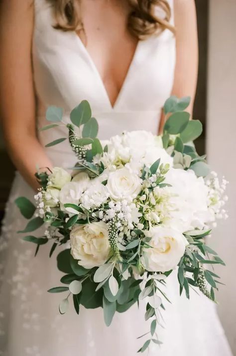 Green & white bridal bouquet Check more at https://beautyfashionideas.com/bridal/green-white-bridal-bouquet/ Wedding Flower Bridal Bouquets, Emerald Green Weddings Bridesmaid White Bouquets, Greenery Bouquet With White Flowers, Off White Bridal Bouquet, Bridal Bouquet White Roses Eucalyptus, White Wedding Bridal Bouquet, Wedding White And Green Flowers, Wedding Green Flowers, White Peony And Greenery Bouquet