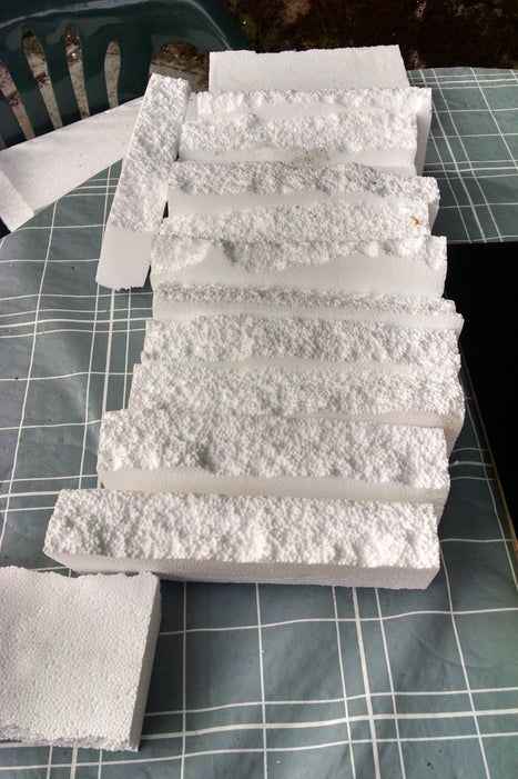 form. Diy Faux Rocks, Faux Rock Walls, Diy Stone Wall, Styrofoam Packaging, Styrofoam Art, Styrofoam Crafts, Fake Rock, Faux Rock, Company Christmas Party