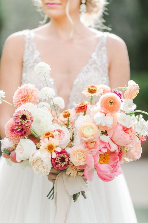 bride holding bouquet with peach, apricot, ivory, and pink flowers and neutral ribbons, Intricate dutch braided low updo that's elegant and just slightly messy for a whimsical look, Estancia La Jolla wedding by Cavin Elizabeth Photography Floral Wedding Inspiration, Wedding Flower Guide, Spring Wedding Inspiration, Spring Wedding Flowers, Coral Wedding, Wedding Flower Inspiration, 100 Layer Cake, Peach Wedding, Whimsical Wedding