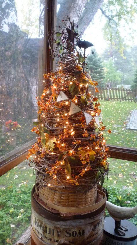 grapevine tree decorated for Fall (like concept, try one for the shows?  have some crows that wld be perfect for...) Grapevine Tree Ideas, Tree Decorated For Fall, Grapevine Tree, Fall Front Porch Decor Ideas, Thanksgiving Tree, Primitive Fall, Fall Front Porch Decor, Tomato Cages, Fall Deco