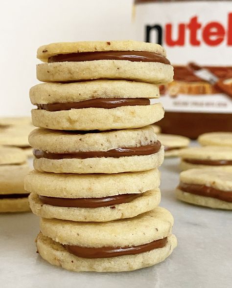 Nutella Sandwich Cookies | e2 bakes brooklyn Walnut Shortbread Cookies, Walnut Shortbread, Cookies With Dark Chocolate, Nutella Sandwich, Hazelnut Cookies, Leftover Dough, Dark Chocolate Ganache, Chocolate Filling, Nectarine