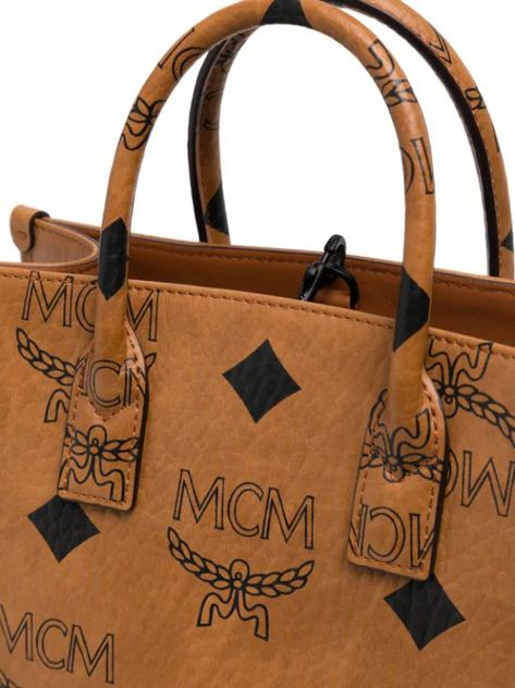 "Who says luxury has to be expensive? Keep an eye out for our MCM sale on the Small Munchen Maxi Visetos-Print Tote Bag! You won't want to miss your chance to snag this designer beauty at a discounted price. Trust us, your wardrobe (and wallet) will thank you later." Mcm Tote Bag, Statement Handbag, Trendy Tote Bags, Latest Bags, Small Tote Bag, Diamond Print, Think Again, Tote Bag Pattern, Work Bags