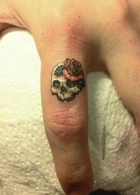 Skull finger tattoo - 55  Cute Finger Tattoos | Art and Design Skull Finger Tattoos, Small Skull Tattoo, Cute Finger Tattoos, Finger Tattoo Designs, Sugar Skull Tattoos, Small Girl Tattoos, Ring Tattoos, Cute Small Tattoos, Diy Tattoo