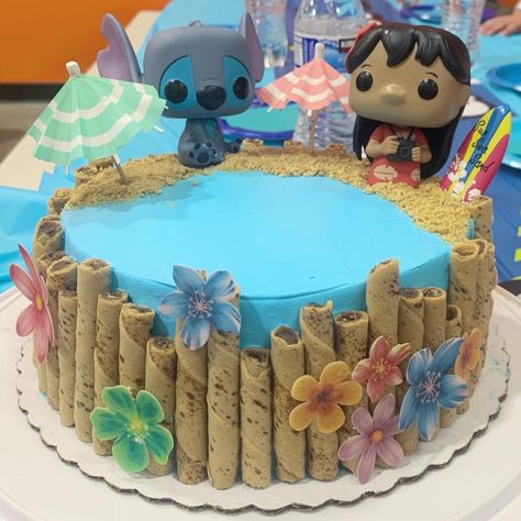 Lilo and Stitch, Funko Pop Cake Pirouettes, Edible Flowers, Graham Cracker Sand, Whipped Frosting, Chocolate Birthday Cake Funko Pop Cake, Stitch Funko Pop, Miniature Camping, Stitch Bday, Lilo And Stitch Party, Lilo And Stitch Cake, Lilo And Stitch Birthday, Stitch Birthday Party, Frosting Chocolate