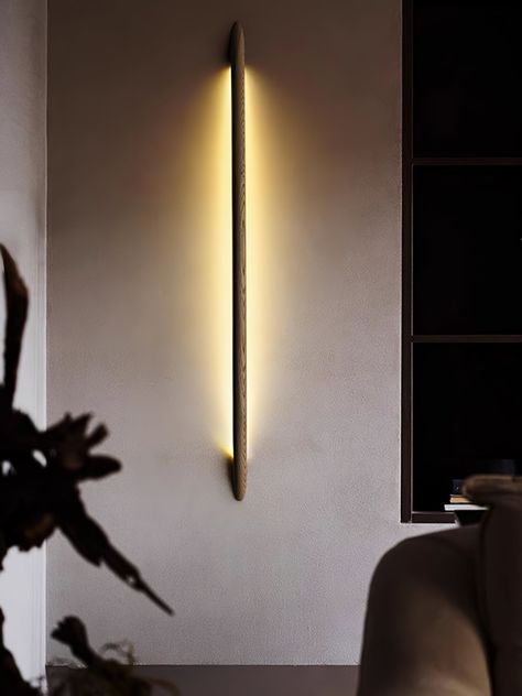 The Linea Wood Wall Light is a minimalist lighting fixture designed with sleek, linear aesthetics in mind. Its slender, elongated form exudes elegance and simplicity, making it a perfect choice for modern and contemporary interiors. Crafted from premium materials, the light offers a soft, diffused glow that enhances the ambiance of any room without overpowering the space. Ideal for hallways, living rooms, or bedrooms, the Linea Wall Light seamlessly blends functionality with a refined, understated style, adding a touch of sophistication to your home decor. 
 If you have any questions about our products, please contact us and we will get back to you within 24 hours. 
 Product Size 
 Size:   Dia 10 cm x H 60 cm /  3.9 x H 23.6 
 Size: Dia 10 cm x H 90 cm /  3.9 x H 35.4 
 Size: Dia 10 cm x H Wood Wall Light, Hallway Wall Lights, Hallway Wall, Minimalist Lighting, Indoor Wall Lights, Contemporary Interiors, Led Spotlight, Picture Light, Small Furniture