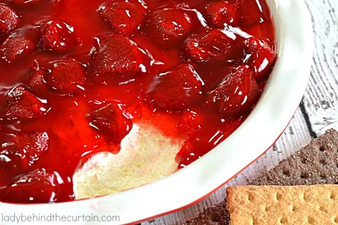 Strawberry Cheesecake Dip | A light a creamy dip with a sweet strawberry topping.  Served with regular graham crackers, chocolate graham crackers or pretze Strawberry Cheesecake Dip, Cheesecake Dip Recipe, Cake Batter Dip, Dip With Cream Cheese, Cheese Sauces, Strawberry Pie Filling, Cheesecake Dip, Chocolate Graham Crackers, Sweet Dips