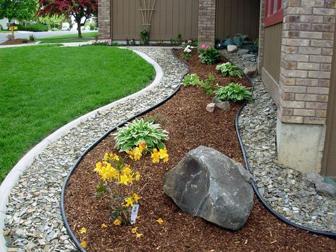 #Yard Tip 1: Add rock #mulch next to your foundation to keep water away; couple that with wood mulch to smother #weeds and keep #plants cool and moist. #BeHouseLogical #Landscaping #LawnCare Garden Mulch, Mulch Landscaping, Window Box Flowers, Small Front Yard, Rock Garden Design, Desain Lanskap, Spring Decoration, Easy Landscaping, Front Yard Landscaping Simple