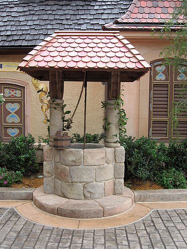 Snow White's Wishing Well | Germany, EPCOT | meeko_ | Flickr Wishing Well Garden, Diy Bird Feeder, Backyard Living, Garden Fountains, Water Well, Garden Structures, Wishing Well, Outdoor Projects, Garden Paths