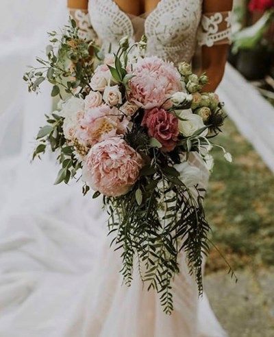 Bride bouquets and wedding bouquets are considered a feature styling element that should ultimately complement the brides wedding dress and her overall look. But choosing the right floral… More Australian Bouquet, Rabbit Warren, Peony Bouquet Wedding, Cascading Wedding Bouquets, Summer Wedding Bouquets, Boho Wedding Bouquet, Wedding Bouquets Bride, Wedding Bouquets Pink, Bridal Bouquet Flowers