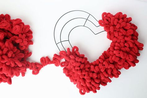 Red loop yarn covers most of the heart shaped wreath form Loop Yarn Valentine Wreath, Yarn Heart Wreath, February Decorations, Cupid Craft, Heart Wreath Form, Heart Wreath Diy, Yarn Heart, Heart Wreaths, Loopy Yarn