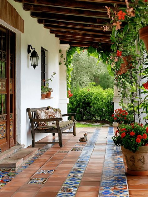 Porch Tile Ideas: Hand-made Spanish Tiles on Terracotta Flooring Saltillo Tile Front Porch, Spanish Colonial Front Porch, Spanish Tiles Outdoor, Tile Porch Ideas, Back Porch Tile Ideas, Colorful Spanish House, Garden Tiles Outdoor Ideas, Courtyard Flooring Ideas, Spanish Front Porch