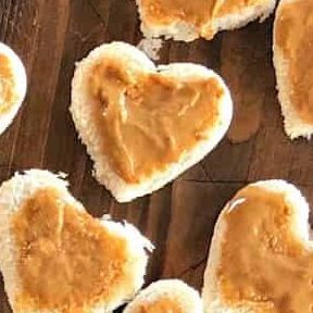 Sandy Coughlin on Instagram: "Valentine’s Day LUNCH Charcuterie Board is filled with heart-shaped peanut butter and jelly sandwiches, meat, cheese, fruit, nuts, and chocolate! ❤️ Share with someone you love! ❤️ Recipe link in profile https://reluctantentertainer.com/valentines-day-lunch-charcuterie-board/ #lunchboard #heartpbj #pbjforever #valentinesdayboard #reluctantentertainer" Lunch Charcuterie Board, Lunch Charcuterie, Nuts And Chocolate, Peanut Butter And Jelly, Charcuterie Board, Nuts, Peanut Butter, Jelly, Sandwiches