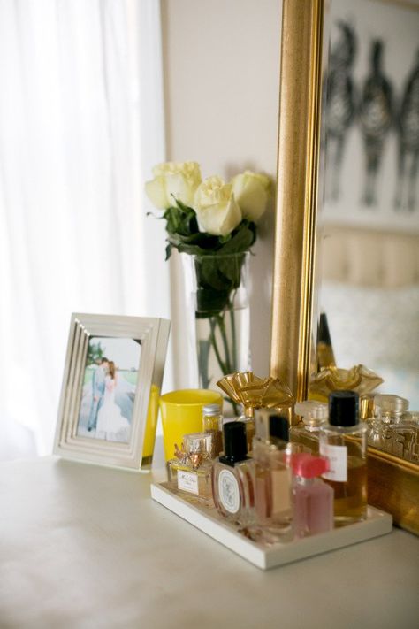 Take a Peek Into This Fashion Blogger's Girly Glam Apartment How To Organize Perfumes On Dresser, Glam Apartment, Glam Dining Room, Profumo Victoria Secret, Koleksi Parfum, Perfume Organizer, Perfume Storage, Perfume Display, Organizer Ideas