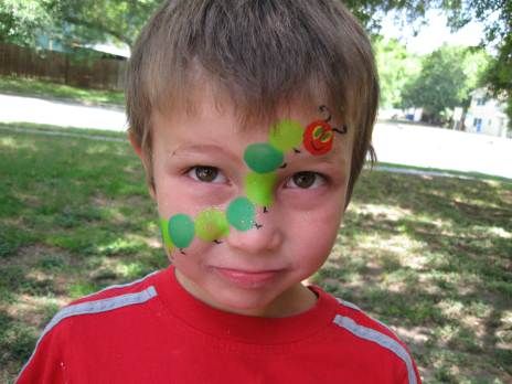 Very Hungry Caterpillar Face Paint Caterpillar Face Paint, Bug Face Painting, Literary Costumes, Character Appearance, Caterpillar Costume, Organic Palette, Hungry Caterpillar Craft, Animal Face Paintings, Festival Paint