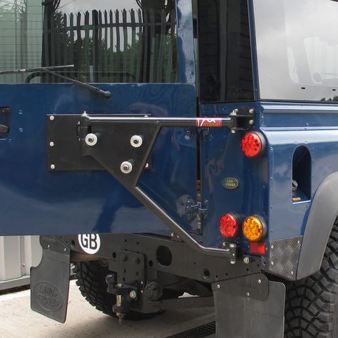 Rear tire carrier swing out by Masai Land Rover Defender Heavy Duty Spare Wheel Carrier Defender Jeep, Land Rover 88, Defender Camper, Wheel Carrier, Tonka Toys, Winch Bumpers, Land Rover Defender 90, Land Rover Defender 110, Jerry Can