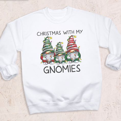 Get your festive cheer on with our 'Chilling with My Gnomies' Christmas Sweater! 🎄🧝‍♂️ Cozy, fun, and perfect for holiday gatherings or just rocking around the tree! Grab yours: www.the-gift-project.com #ChristmasSweater #HolidayFun #GnomiesStyle Gnomies Christmas, Holiday Gathering, The Tree, Christmas Sweater, Holiday Fun, Christmas Sweaters, Festival, Christmas