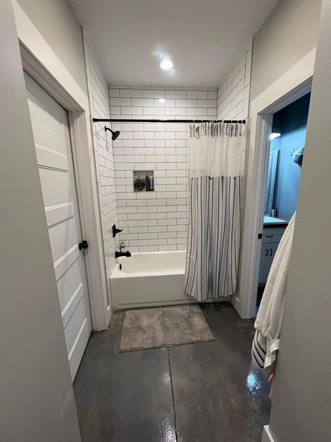 Barndominium Master Bath Ideas, Master Bath Barndominium, White House Black Trim Cedar Accents, Barndominium Guest Bathroom, Barndo Minimum Interior, Barndo Bathroom, 2 Bed 1.5 Bath Barndominium, Concrete Floors In House, Shop With Living Quarters