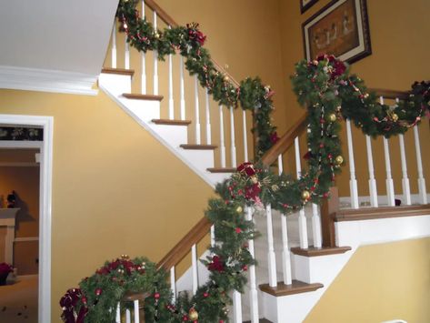 How to Properly Store Your Christmas Garland Away | Kennesaw, GA Patch Christmas Garland Storage, Christmas Garland Storage Ideas, How To Store Christmas Garland, Garland Storage Ideas, Christmas Staircase Garland, Garland Storage, Christmas Light Storage, Christmas Garland Staircase, Christmas Garland On Stairs