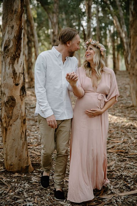 maternity photo shoot with flower crown couple outdoor trees Crown Maternity Shoot, Maternity Flower Crown, Family Maternity Pictures, Pink Flower Crown, Baby Bump Photos, Boho Maternity, Bump Photos, Maternity Photo Shoot, Outdoor Trees