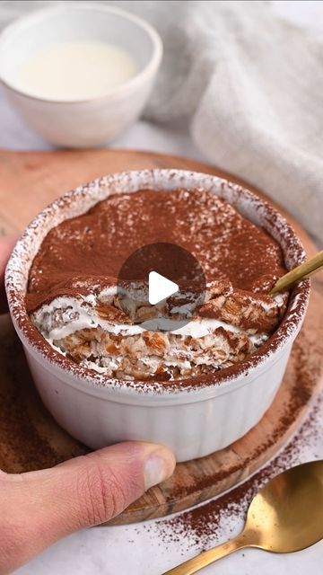 Matteo • Easy Healthy Recipes on Instagram: "Did you know that you can make HEALTHY TIRAMISU with… rice cakes?! Follow @mattsfitchef for healthy and high protein recipes

26 g protein and no protein powder!
SAVE to try 👇

INGREDIENTS
- 3 rice cakes
- 200 g (4/5 cup) Greek yogurt, Skyr (or yogurt of choice)
- sweetener of choice (to taste)
- brewed coffee
- sprinkle cocoa powder
DIRECTIONS
- Prepare coffee, then pour it in a bowl and sweeten to taste, if you desire.
- For the tiramisu “cream”, mix yogurt with your favorite sweetener to taste (I added 1 tsp erythritol to mine).
- As shown in the video, spread a couple tablespoons of yogurt over a medium bowl. Now dip 1 rice cake into the coffee and line over the yogurt. Cover the rice cake with an additional layer of yogurt and repeat the r Healthy Tiramisu, Skyr Recipe, Tiramisu Cream, Brewed Coffee, Protein Recipes, Rice Cakes, High Protein Recipes, Protein Foods, Protein Powder