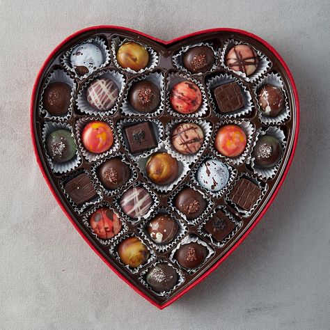 #ValentinesDay fact no.9 - The first #heartshapedbox of chocolates was introduced in 1861. Richard Cadbury of @CadburyUK started packaging chocolates in fancy boxes to increase sales. Now, more than 36 million heart-shaped boxes of chocolates are sold each year. 🍫 Heart Box Of Chocolates, Chili White, Milk Chocolate Ganache, Hazelnut Milk, Fancy Boxes, White Chocolate Ganache, Box Of Chocolates, Fondue Set, Heart Shape Box