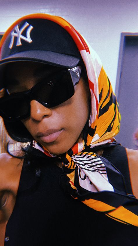 @supremekourtnee for enisle studios   scarf hat combo outfit, black prada glasses, summer inspo Scarf And Cap Outfit, Hat And Scarf Combo, Scarf Hat Outfit, Cap And Scarf Outfit, Scarf On Head Outfit, Scarf And Hat Outfit, Black Baseball Hat Outfit, Snapback Hat Outfit, Visor Hat Outfit