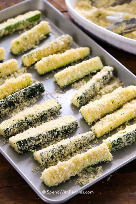 Crispy oven fried Zucchini sticks are a great snack, side or appetizer. Panko and parmesan cheese make a crispy exterior and for tender garden zucchini! #spendwithpennies #zucchinifries #parmesanzucchinifries #friedzucchini #ovenfried #appetizerrecipe #easyrecipe Fried Zucchini Recipes, Zucchini Pommes, Parmesan Zucchini Fries, Zucchini Recipes Baked, Crispy Oven Fries, Zucchini Sticks, Veggie Fries, Baked Zucchini, Bake Zucchini