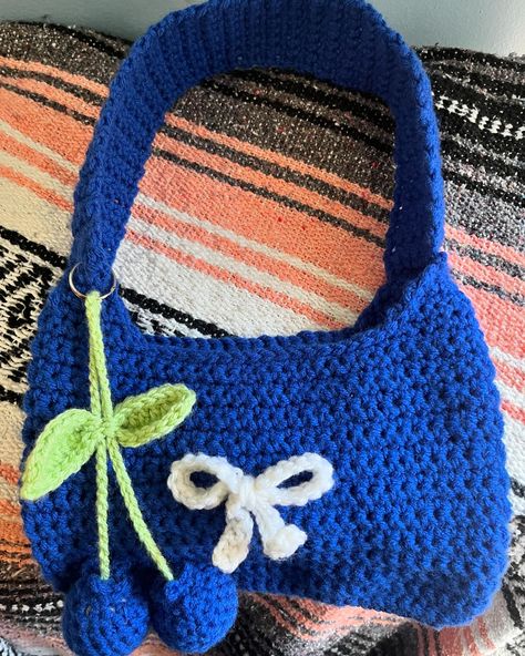 Customized navy blue shoulder bag with a blueberry charm💙🫐 • • • • #crochetbags #crochet #bag #shoulderbag #crochetaddict #crochetlove #smallbusiness #crochetersofinstagram #pennsylvania #baglovers #blueberry Blueberry Crochet, Blue Shoulder Bag, Navy Bag, Crochet Bag, Free Crochet Pattern, Pennsylvania, Free Crochet, Free Pattern, Navy Blue