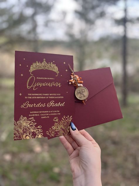 "CONGRATULATIONS!  We are happy to be with you on this special day. 🌸 ♥️ This invitation has a burgundy envelope color. You can decorate the envelope with our floral seal models. Invitation area is of two types; these are \"gold gilding printing on icy acrylic\" and \"gold gilding printing on high quality burgundy cardboard\" A great design is available in the invitation area. ♥️ You can customize this invitation model according to the type of event you want. It is possible to personalize for many activities such as wedding cards, birthday cards, baby showers. For this, it will be enough to contact us! ♥️ Please share your information with me via message. You can send me your invitation information, address, location, date and names via message. I will make a design for you using your inf Wine Quinceanera Theme, Wine Red Quince, Quince Invitations Ideas, Burgundy And Gold Quinceanera Theme, Red Quince Invitations, Xv Invitations, Burgundy Quinceanera Decorations, Burgundy Quince, Burgundy Quinceanera Theme