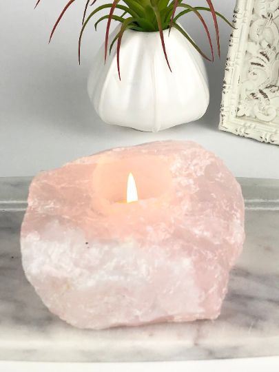 Introducing our beautiful Rose Quartz tea light candle holder - the perfect addition to your home decor! Made from high-quality raw rose quartz crystal, this candle holder will bring a touch of natural elegance to any room. The delicate pink hues of the rose quartz create a warm and inviting atmosphere, making it the perfect choice for relaxing evenings or special occasions. Rose Quartz Candle Holder, Rose Quartz Candle, Rock Candle Holder, Quartz Candle, Quartz Candle Holder, Rose Quartz Meaning, Rock Candle, Stone Candles, Crystal Holder