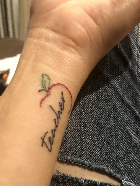 Teacher Tattoo. 20 year anniversary in education. #teachertattoo #appletattoo #redapple #wristtattoo Latin Kings Tattoos, Teaching Tattoos, Teacher Tattoo, Teacher Tattoos, Apple Tattoo, About Teacher, Tato Dengan Makna, Places For Tattoos, Tattooed Teacher