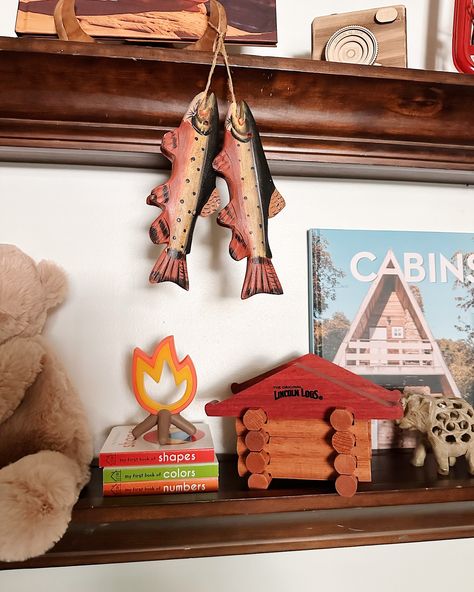 A year ago today, we found out about our newest roommate. Felt appropriate to finally get around to sharing pictures of his room 🏕️🎣🌞🪵👶🏻 Nursery reveal, baby room inspiration, summer camp theme room, retro cabin interior design, boy’s room, outdoorsy design, kid’s room Camping Nursery Theme Gender Neutral, Camping Wall Decor, Happy Camper Nursery Theme, Vintage Camp Nursery, Camping Nursery Theme Boys, Camp Theme Nursery, Camping Kids Room, Cabin Themed Nursery, Outdoors Nursery Theme