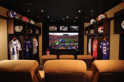 i wouldnt mind watching football in a place like this. except they'd all be tebow jerseys instead of just one. haha. Dream Man Cave, Sala Cinema, Sports Man Cave, Basement Home Theater, Ultimate Man Cave, Man Cave Basement, Man Cave Home Bar, Woman Cave, Home Theater Rooms