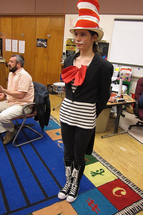 Seussical, Jr. Costumes-- my Cat in the Hat costume:  Black coat w/tails, striped tee, red satin bow, black skinny jeans, Converse boots, classic Seuss hat Cat In The Hat Costume, Dr Seuss Costumes, Seussical Jr, Cat Costume Kids, Seussical Costumes, Creative Halloween Costumes Diy, Converse Boots, Jeans Converse, Book Week Costume