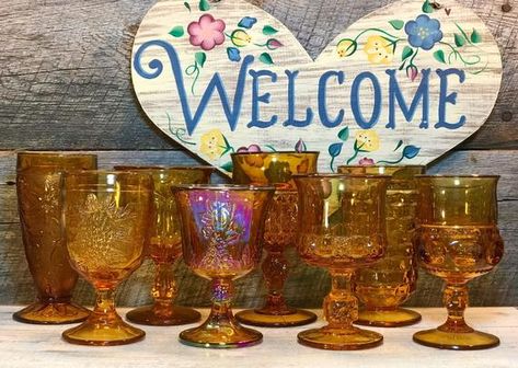 A STUNNING collection of stunning AMBER mismatched goblets! -QUANTITY: Set of 8 (Eight) -Includes these gorgeous vintage/antique patterns: •Amber LG Wright Cube and Daisy Goblet •Tiffin King’s Crown Amber Water Goblet •Amber WhiteHall Goblet by Colony •Imperial Glass Old Williamsburg Amber Water Vintage Stemware, Amber Moon, Vintage Goblets, Weddings Receptions, Imperial Glass, Mount Vernon, Water Goblets, Glassware Collection, Wine Goblets