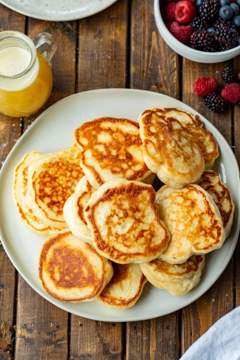 Your weekend breakfast routine is just about to get an update! Oladi Ukrainian pancakes are totally irresistible! #oladi #pancakesrecipe #ukrainianpancakes Ukrainian Pancakes, Favorite Breakfast Recipes, Breakfast Routine, Raspberry Sauce, Creamed Honey, Weekend Breakfast, Breakfast Recipe, Instant Yeast, Pancake Recipe