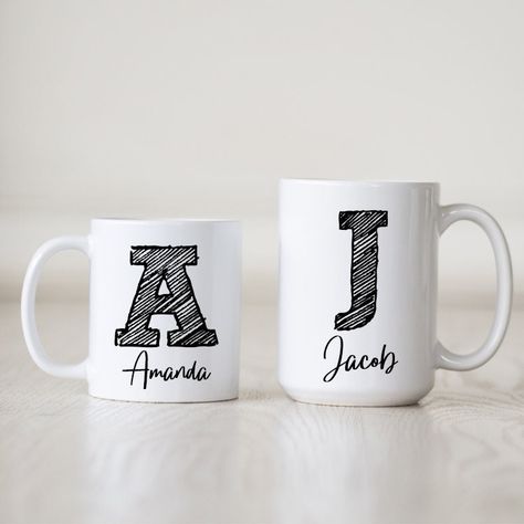 Personalized Scribble Letter Coffee Mug is the perfect house warming gift, personalized mugs for couples. Design features a large single inital with the name below. If you would like to change the color of the initial and name, please send us a message when you place your order. A beautiful and glossy A+ quality 11oz ceramic mug. How to personalize: Include your name in the personalization box.     11 oz or 15 oz ceramic     Imprinted on both sides     White mug handle     Dishwasher Safe     Mi Mugs For Couples, Mug Handle, Custom Coffee Mugs, Initial Mug, Letter Mugs, The Perfect House, Couple Mugs, Perfect House, Personalized Coasters