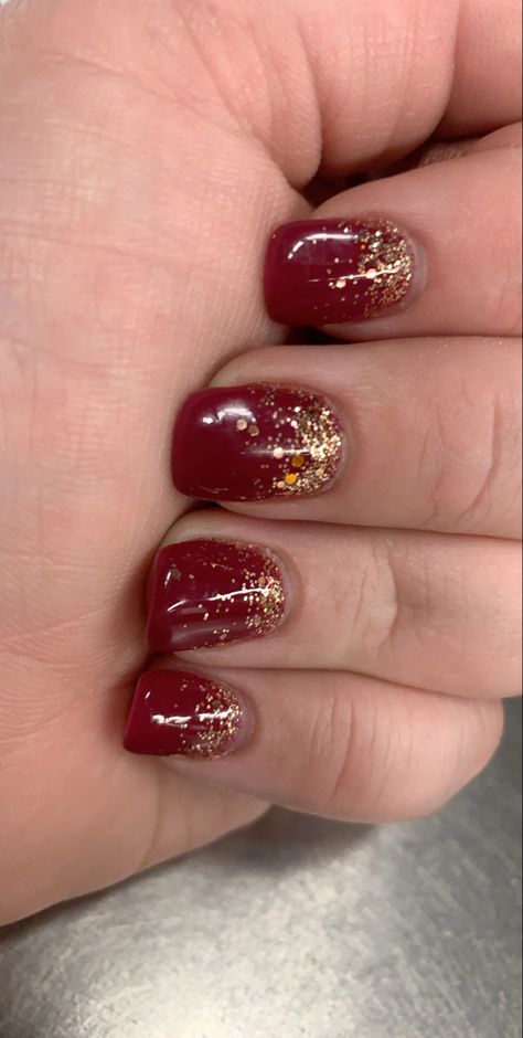 Red And Golden Nails Design, Red And Gold Manicure Ideas, Garnet Gold Nails, Red Wedding Nails Bridesmaid, Red Gold Silver Nails, Christmas Nails Short Red And Gold, Red With Gold Glitter Nails, Dark Red Nails With Gold Glitter, Red And Gold Nail Designs Short