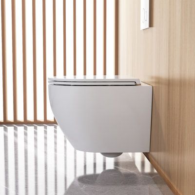 Made from quality ceramic material, the American standard wall-hung toilet with a fully skirted design contributes to a smooth and seamless surface that indicates the aesthetic style of a modern bathroom. The strong ceramic constructions of this compact toilet for small bathrooms can effectively prevent harbouring bacteria and yet is easy to clean. Tankless toilet wall mount installation way can effectively save space for small bathrooms and meet the diverse needs for bathroom decoration. | Deer Compact Toilet, Tankless Toilet, Space Saving Toilet, Kohler Toilet, Toilet Installation, Sauna Accessories, Traditional Toilets, Toilet Wall, Bidet Toilet