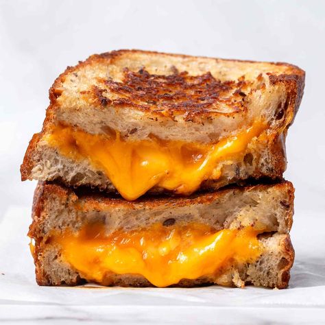 These Are the Best Cheeses for Grilled Cheese, According to Chefs Grilled Feta Cheese Sandwich, Best Cheese For Grilled Cheese, Three Cheese Grilled Cheese, Cheeses For Grilled Cheese, Baked Grilled Cheese, Girls Luncheon, Easy Breakfast Brunch, Nostalgic Childhood, Making Grilled Cheese