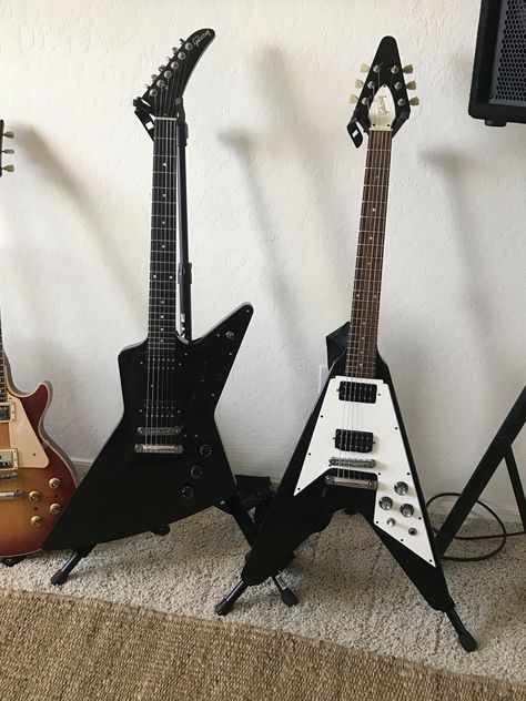 2004 Gibson Explorer w/ 1993 Gibson Flying V. Double Trouble if you ask me! Guitar Reference, V Guitar, Explorer Guitar, Flying V Guitar, Horror Movies List, Acoustic Guitar Photography, Gibson Flying V, Gibson Explorer, Signature Guitar